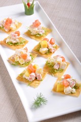 canapes with smoked salmon and red caviar