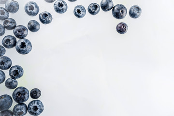 Fresh berries pattern - blueberries, strawberries, blackberries. On white background, top view, flatlay layout