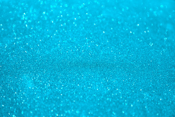 blue glittering christmas lights. Blurred abstract holiday background