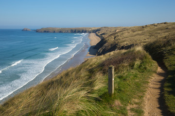 South west coast path view to Perran sands beach near Perranporth North Cornwall England 