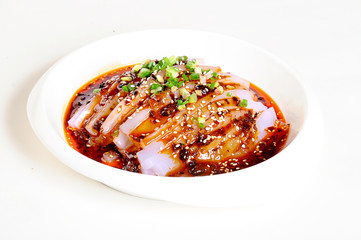 rice with vegetables and meat on plate isolated on white