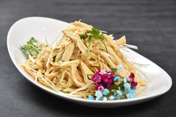 pasta with pesto sauce and fresh basil