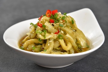 pasta with pesto sauce and basil