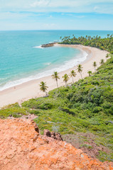 Top view of Praia de Coqueirinho at Costa do Conde. Photo taken at Mirante Dedo de Deus belvedere. Conde PB, Brazil. View of a northeastern Brazilian beach, the sea and nature around.