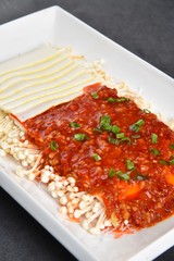 pasta with tomato sauce and basil