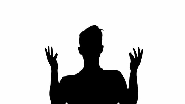 Front view of silhouette of man meditating and showing mudras isolated on white