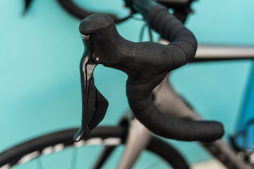 Road bike black shifterd located on bar integrated wirh brakes