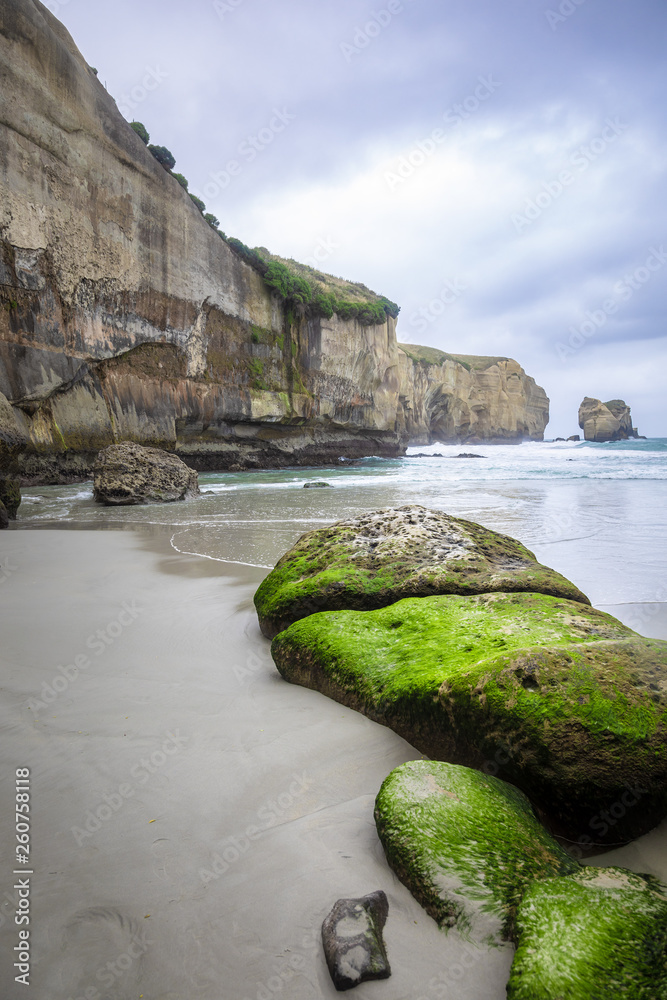 Wall mural tunnel beach new zealand