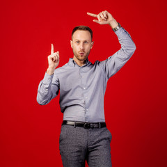 Fototapeta premium man over red background. people and emotion concept.