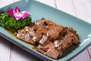 grilled steak with vegetables on white plate