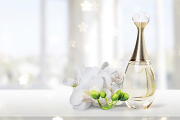 Aromatic Perfume bottles on background