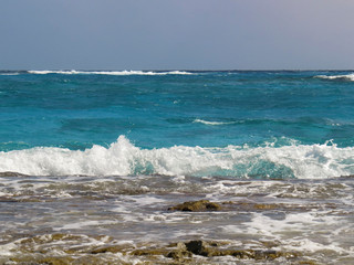waves crashing on rocks