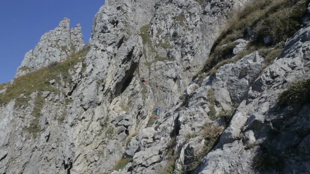 Panoramic view of the towers and spiers of the southern Grigna from the direct route, on a sunny autumn day.