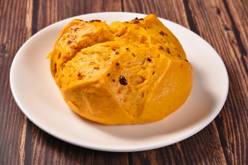 pumpkin pie on a plate