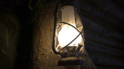 13754_Dirt_dust_and_cobwebs_on_the_lighted_lamp.jpg