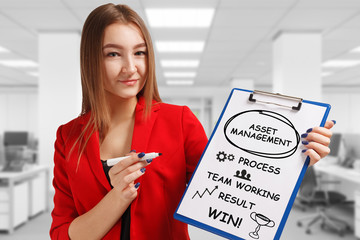 Business, technology, internet and networking concept. Young entrepreneur showing keyword: Asset...