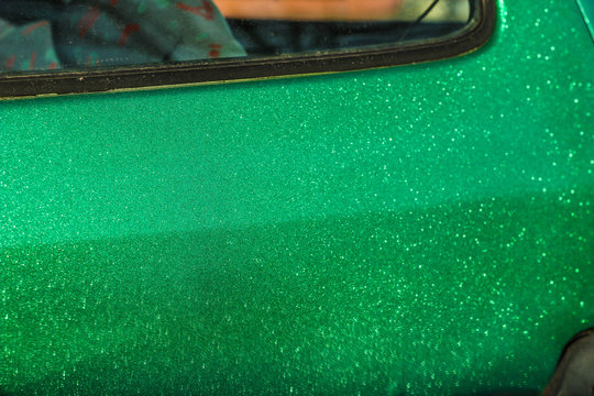 Green Paint Car Body Film With Sparkles Shimmers In The Sun.