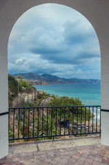 View of the coast through arch