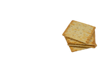 Cracker biscuits over white background. Selective focus