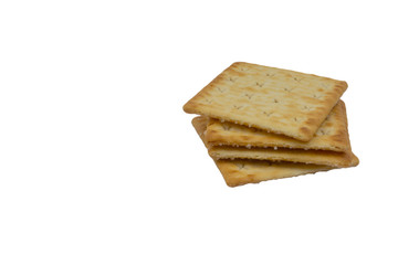Cracker biscuits over white background. Selective focus