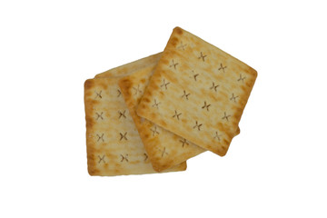 Cracker biscuits over white background. Selective focus
