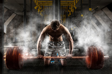 Man workout with barbell