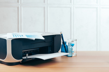 Copier or printer in a modern office interior close up