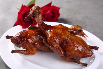 grilled pork ribs on white plate