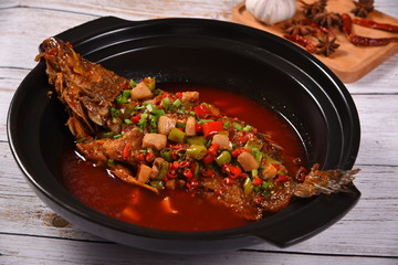 meat and vegetables in a pan
