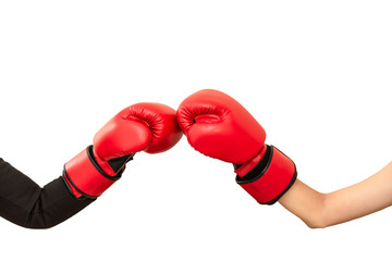 Two hands wear red boxing gloves punching ,fighting strategy business and creative ideas isolated on white .Competition in the new business concept