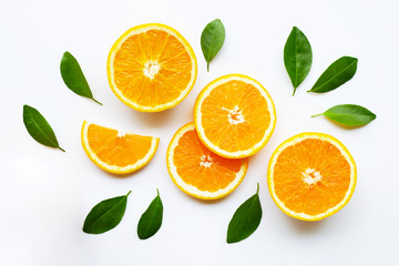 Fresh orange citrus fruit with leaves on white