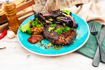 fondant beef paleron and its juice at the winemaker