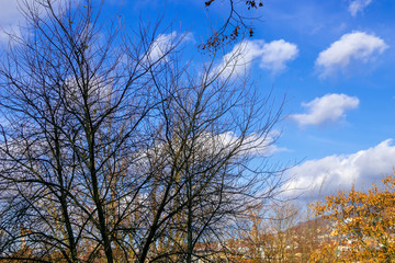 Background of beautiful blue sky and white clouds over the mountains.