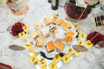 Different kinds of baked sweets on a buffet