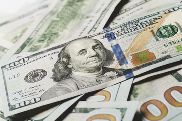 American dollars. A stack of hundred dollar bills. Close up