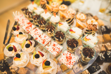 Different kinds of baked sweets on a buffet