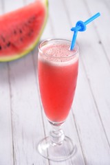 red cocktail with strawberry