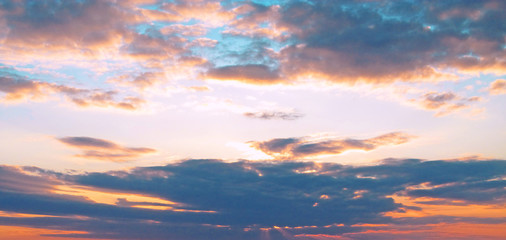 Beautiful sunset. The sky in the clouds.