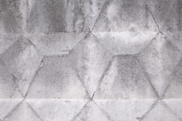Faceted concrete wall