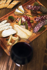 Cheese, sausages and red wine as an appetizer