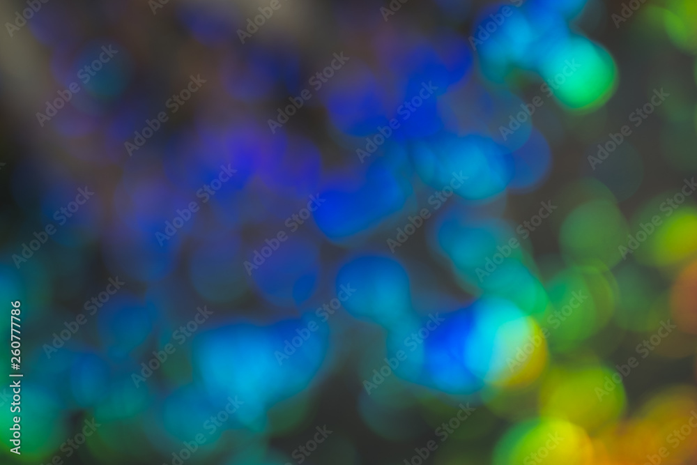 Wall mural blurred lens flare glow. festive fireworks. bokeh sparkles