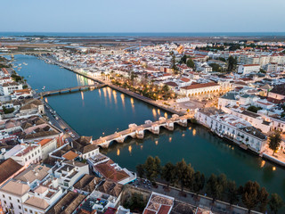 Naklejka premium Aerial cityscape of beautiful Tavira in the evening, Algarve, Portugal