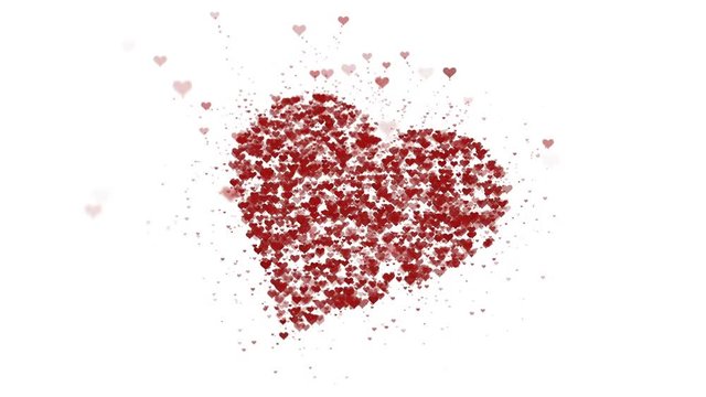 Red heart is isolated on white background. Accumulation of little hearts creates one large heart. The whole heart is being zoomed. Close up. Copy space.
