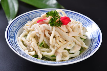 pasta with pesto sauce and fresh basil