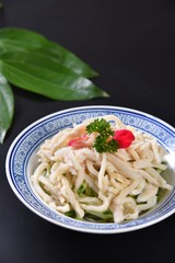 pasta with pesto sauce and basil