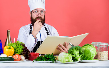 Food for salads. Chef man in hat. Secret taste recipe. Bearded man cook in kitchen, culinary. Vegetarian. Mature chef with beard. Dieting and organic food, vitamin. Healthy food cooking