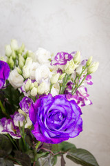 A beautiful bouquet of fresh pink roses in an expensive vase