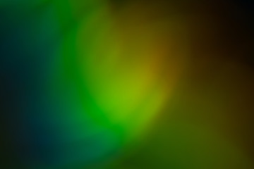 Blurry lights background. Defocused lens flare glow. Abstract illuminated bokeh design.