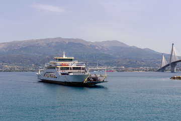 A floating ship next to the city Rion (Greece)