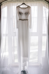 wedding dress on the window